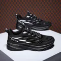 Men's breathable mesh running shoes in black and white with thick rubber soles - EU 35 / Black