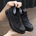 Slip-on breathable black mesh sneaker with silver glitter accents and flexible sock collar - Black / EU 36