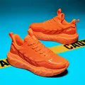 Breathable bright orange running shoes with thick cushioned sole and mesh upper - EU 39 / Vibrant Orange