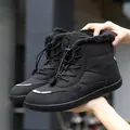 Black high-top winter snow boots with warm plush lining and reflective toe detail - EU 36 / Black