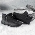 Black waterproof winter snow boots with quilted pattern and warm fur lining in outdoor snow - EU 36 / Black