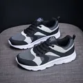 Women's lightweight mesh sneakers in black and grey patchwork with soft breathable soles - EU 36 / Black and White
