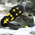 Green leather outdoor hiking boot with warm fleece lining and yellow accents in snow - EU 39 / Army Green