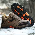 Brown leather outdoor hiking boots for men with warm faux fur lining and non-slip soles - EU 39 / Brown