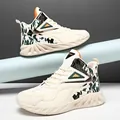 Men's high-top sneakers in creamy white with green camouflage accents and orange details - 39 / Khaki