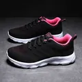 Women's breathable mesh sneakers in black and pink with white cushioned soles - EU 35 / Black/Rose Red