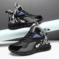 Men's high-top black winter sneakers with camouflage patterns and warm faux fur lining - EU 39 / Black