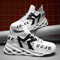 Men's white breathable mesh low-top sneakers with geometric black supports and blade sole - EU 36 / White