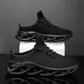 Scarpa sportiva nera da uomo in mesh con suola ammortizzata cava e design traspirante - 39 / Nero