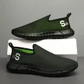 Slip-on mesh men's sports shoes with breathable black and green woven fabric design - EU 39 / Black