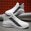 Men's white breathable knitted mesh running sneakers with grey patterned side stripes - EU 39 / White