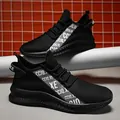 Men's black breathable mesh sneakers with white striped tape and cushioned rubber sole - EU 39 / Black