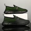 Heren slip-on hardloopschoenen van ademend mesh in zwart en groen met dikke rubberen zool - EU 39 / Zwart