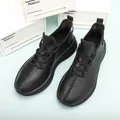 Men's black slip-on faux leather fashion sneakers with lychee texture and rubber sole - EU 40 / Black
