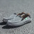 Men's dark gray canvas slip-on loafers with thick rubber soles and green tag detail - EU 39 / Gray