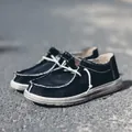 Men's casual black canvas loafers with decorative white hand-stitching and rubber soles - EU 39 / Black