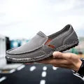 Men's dark gray slip-on canvas shoes with rubber sole and side elastic leather details - EU 39 / Gray