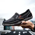 Classic black men's canvas slip-on shoe with white stitching and woven texture sole - EU 39 / Black