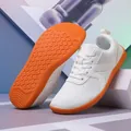 White breathable mesh sneaker with vibrant orange anti-slip rubber sole and X-lines - EU 36 / White
