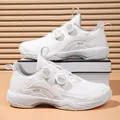 White sports shoes featuring a rotary buckle lacing system and breathable mesh - EU 36 / White