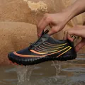 Black outdoor water shoe with orange stripes and non-slip rubber sole for hiking - EU 35 / Gray