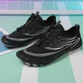 Black barefoot water shoes with silver stripes and quick-lace system for outdoor sports - EU 35 / Black