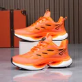 Zapatillas running naranjas de malla transpirable con suela amortiguadora para adultos - Naranja