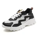 Women's chunky platform sneaker in white and black mesh with elegant gold leather accents - EU 36 / Black