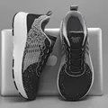 Chaussures de course pour hommes en tricot noir et blanc avec semelles EVA - 36 / Noir et Gris