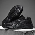 All-black platform dad sneaker with breathable mesh panels and thick anti-slip sole - EU 36 / Black
