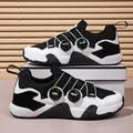 Chaussures de sport noires et blanches avec double laçage à cadran et semelle épaisse - EU 36 / Molette / Blanc Noir