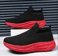 Classic black breathable knit sock sneakers featuring a thick cushioned red sole - 36 / Black Red
