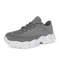 Breathable grey flyknit walking shoe with white polka dot cushioned sole for comfort - 36 / Gray