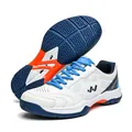 White tennis shoes with blue and orange accents and hexagonal grip rubber sole - EU 40 / White & Dark Blue