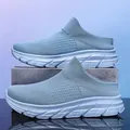 Light blue slip-on flyknit sports mule sneakers with thick breathable mesh sole - Blue