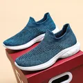 Navy blue breathable fly-knit slip-on walking shoes with thick white foam soles - Sky Blue