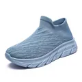 Light blue flyknit walking shoes for men featuring breathable mesh and slip-on design - Blue