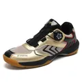 Golden and black indoor badminton shoes with a rotating lace buckle and mesh panels - 36 / Black & Gold