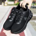 All-black breathable mesh walking shoes with convenient drawstring laces and soft sole - EU 39 / Men's Black