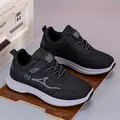Black lightweight walking shoes with breathable mesh and Velcro closure for comfort - EU 38 / Black
