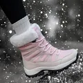 Pink waterproof winter snow boots for women with warm faux fur lining and non-slip soles - EU 36 / Pink