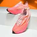 Vetersneakers van mesh met een verloop van roze naar oranje voor dames en heren - EU 33 / Koraalroze