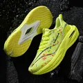 Neon groen hardloopschoenen met kleurrijke inktspatten patronen en dikke dempende zool - EU 36 / Fluorescerend Groen