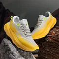 Modern thick-soled sneakers in bright yellow and grey with a textured cushion sole - EU 39 / Yellow