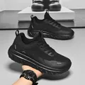 All-black breathable mesh running shoe for men with thick wave-patterned rubber sole - 39 / Black