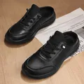 Men's casual black leather mule slippers with lace-up detail and thick rubber sole - EU 35 / Black