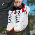 Breathable white sports shoe with red and blue accents for tennis and badminton - EU 40 / White Red
