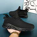 Men's lightweight black knit running shoes with thick cushioned wave-texture sole - EU 39 / Black