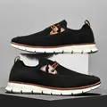 Men's black fly-knit walking shoes with white flexible soles and brown accents - EU 40 / Black