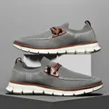 Men's breathable grey flyknit slip-on sneakers with brown leather accents and white sole - EU 40 / Gray